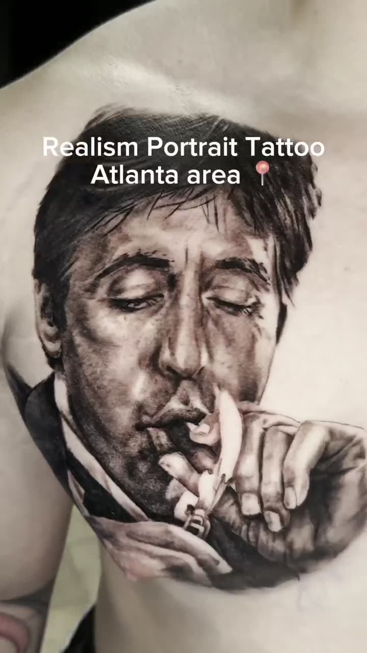 Video of a black and grey realism portrait tattoo of Al Pacino